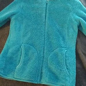 Blue sweater with some jeans